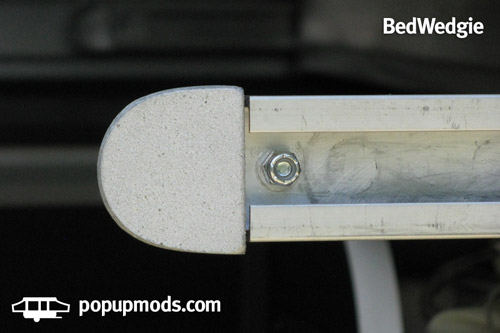 Image of a BedWedgie cast aluminum bed rail end by popupmods.com