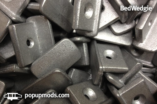 Image of cast aluminum Shorts bed rail ends by popupmods.com